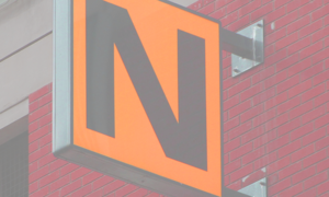 Sign on building with the letter "N"